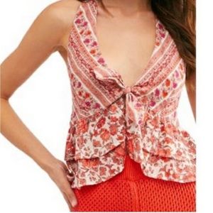 Size XL Free people Charm Halter in orange and sherbert warm cream.  Like new.